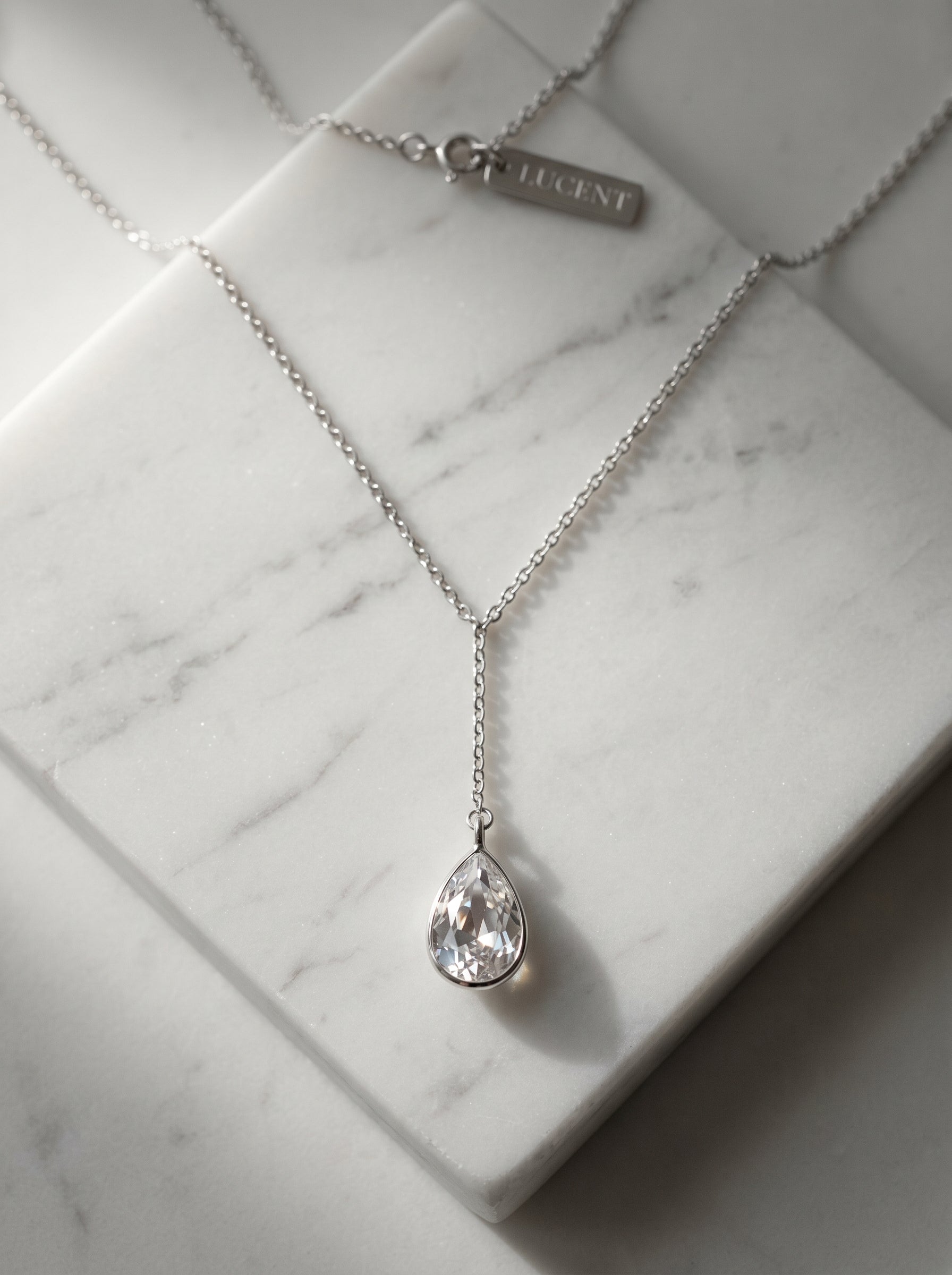 Lifestyle Flat Lay — LITENG Jewelry