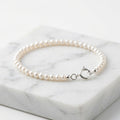 WCJ S999 Sterling Silver Pearl Bracelet main product shot on white marble background