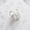 WCJ Minimalist Open Geometric Stacking Rings 3-Piece Set on white marble