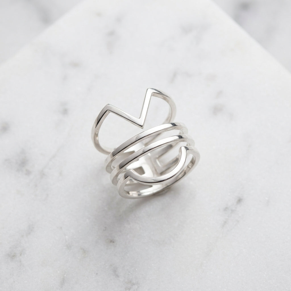WCJ Minimalist Open Geometric Stacking Rings 3-Piece Set on white marble
